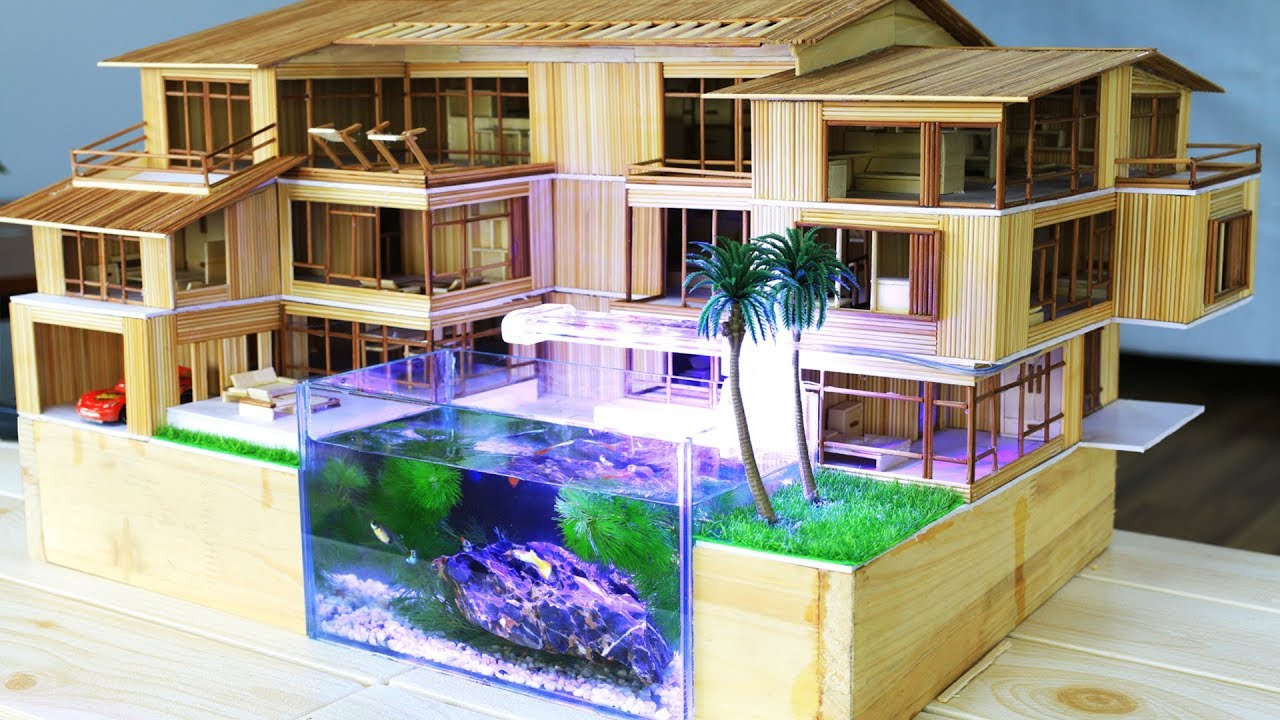 Trang trí bể thủy sinh bằng mô hình nhà ở miền Tây